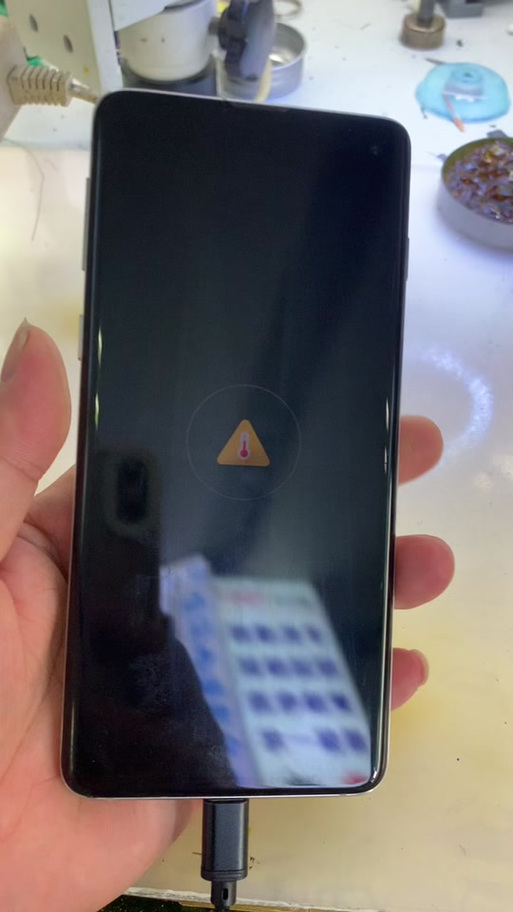 三星充电显示三角形感叹号振动